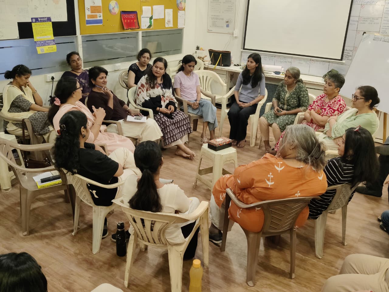 People sharing together in a facilitated Attune Gathering